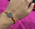 Intricate OM Leaf Rakhi