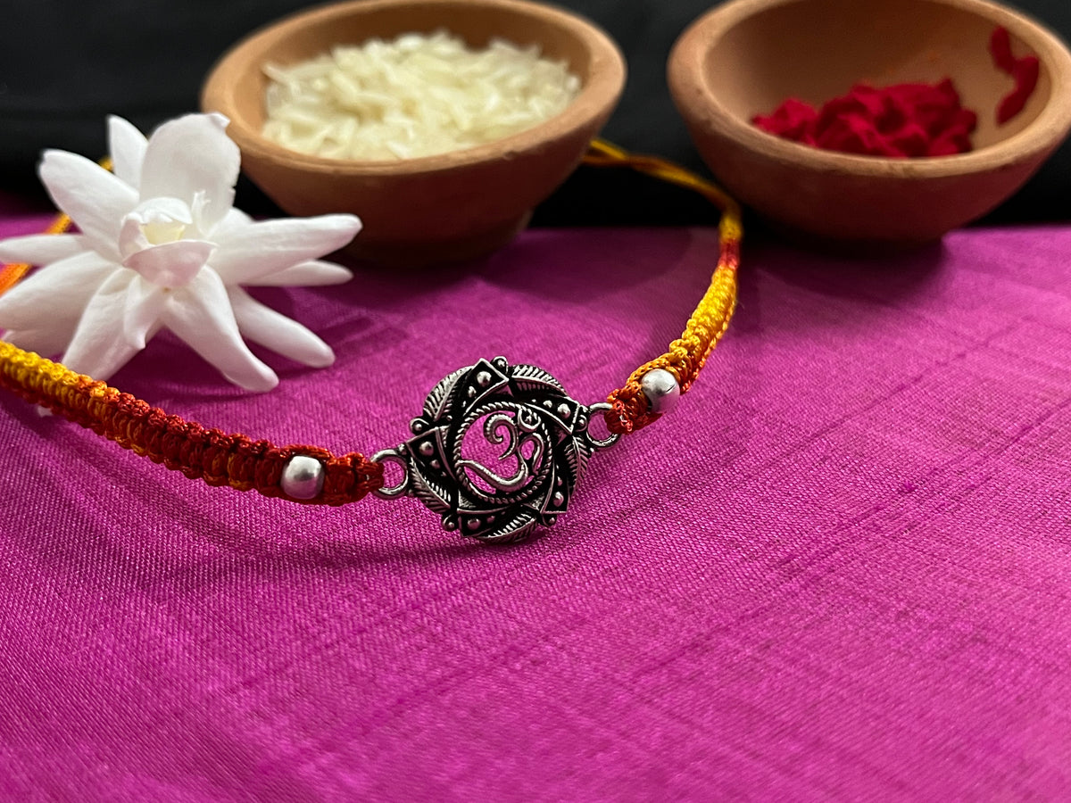 Intricate OM Leaf Rakhi