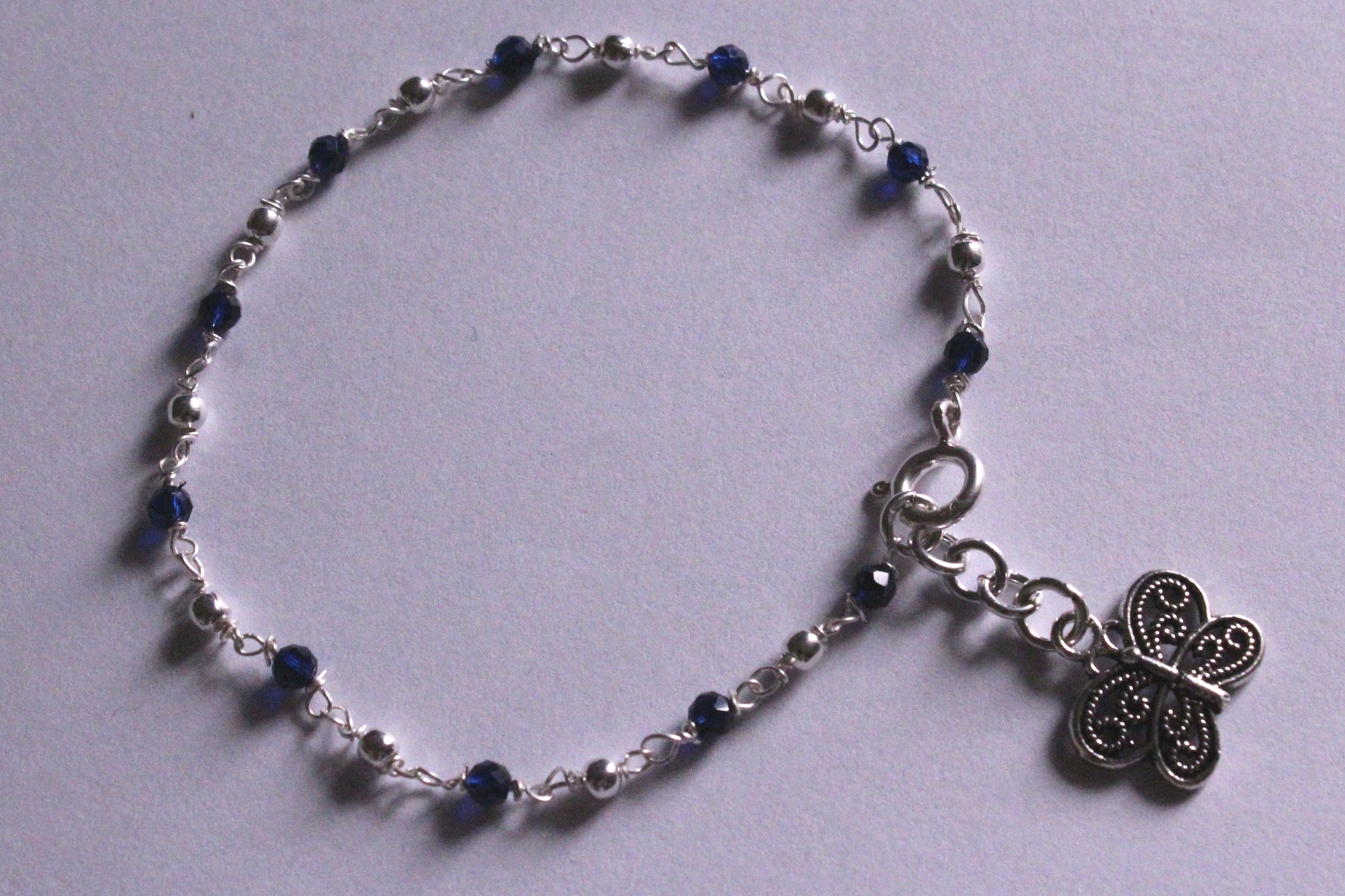 Silver and Royal Blue beads Bracelet with Butterfly Charm