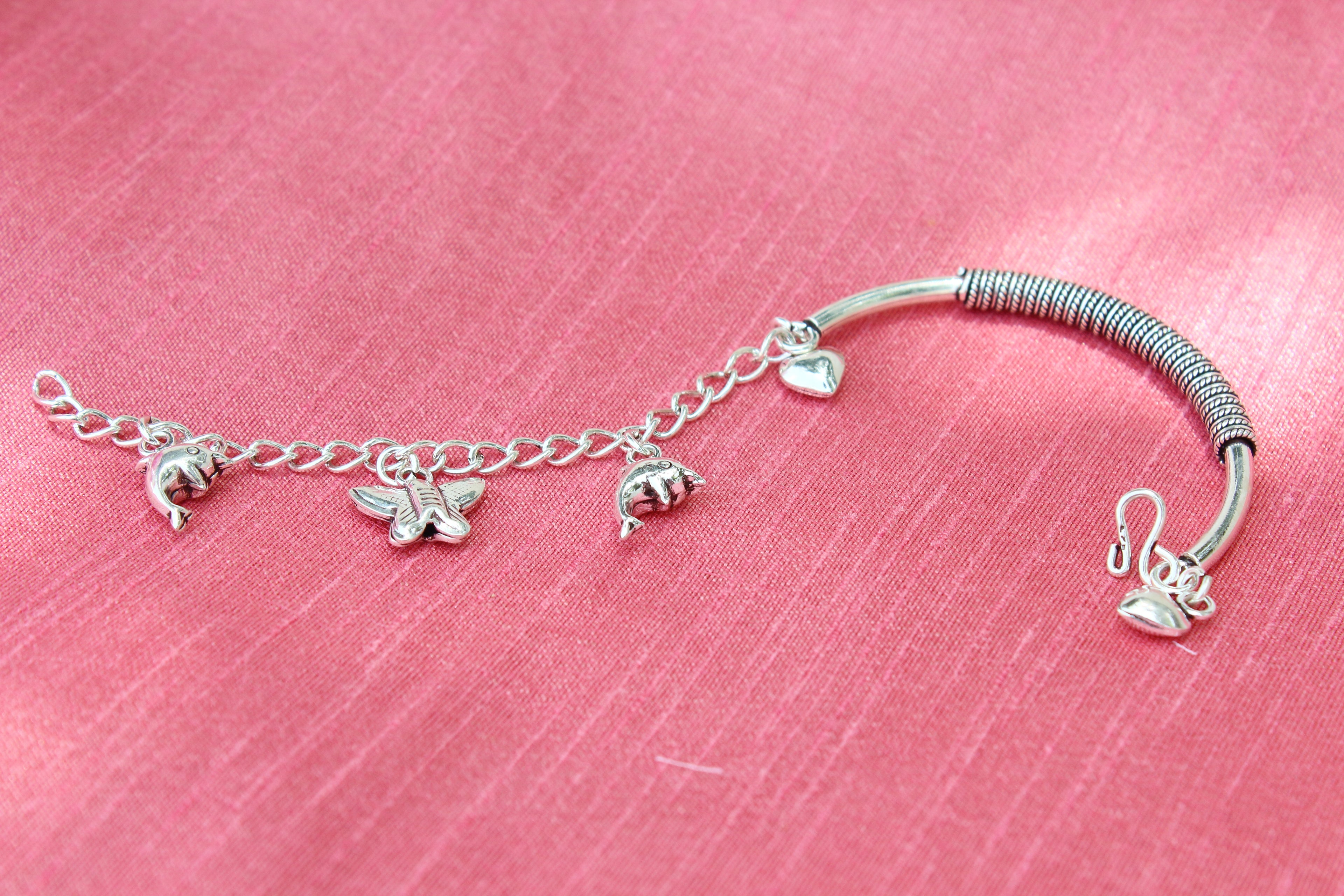 Butterfly dolphin charms bracelet