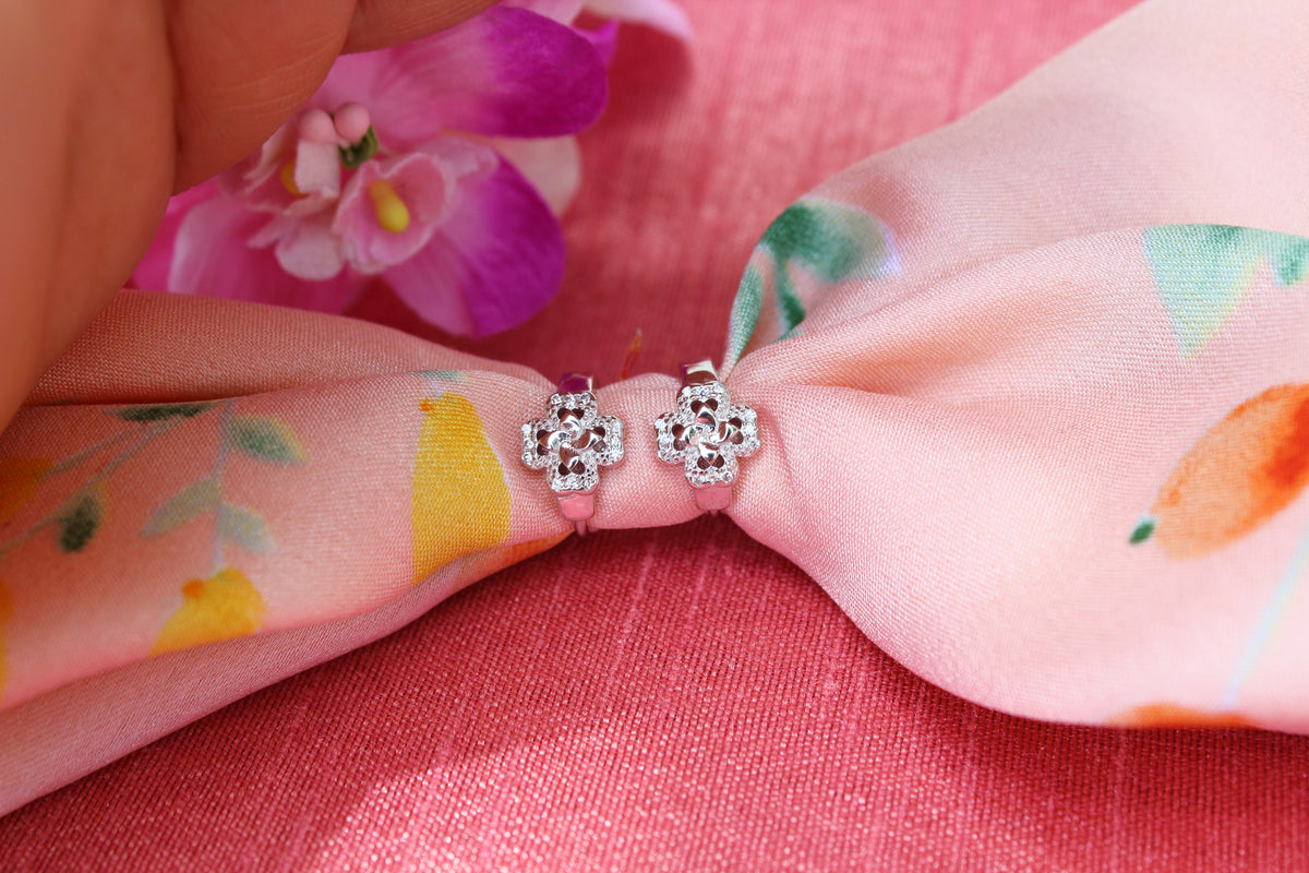 Zircon studded flower hoop