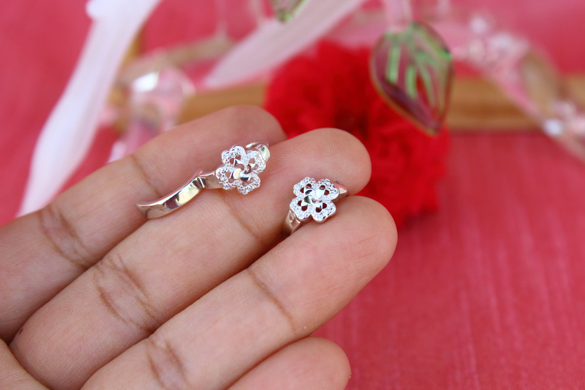 Zircon studded flower hoop