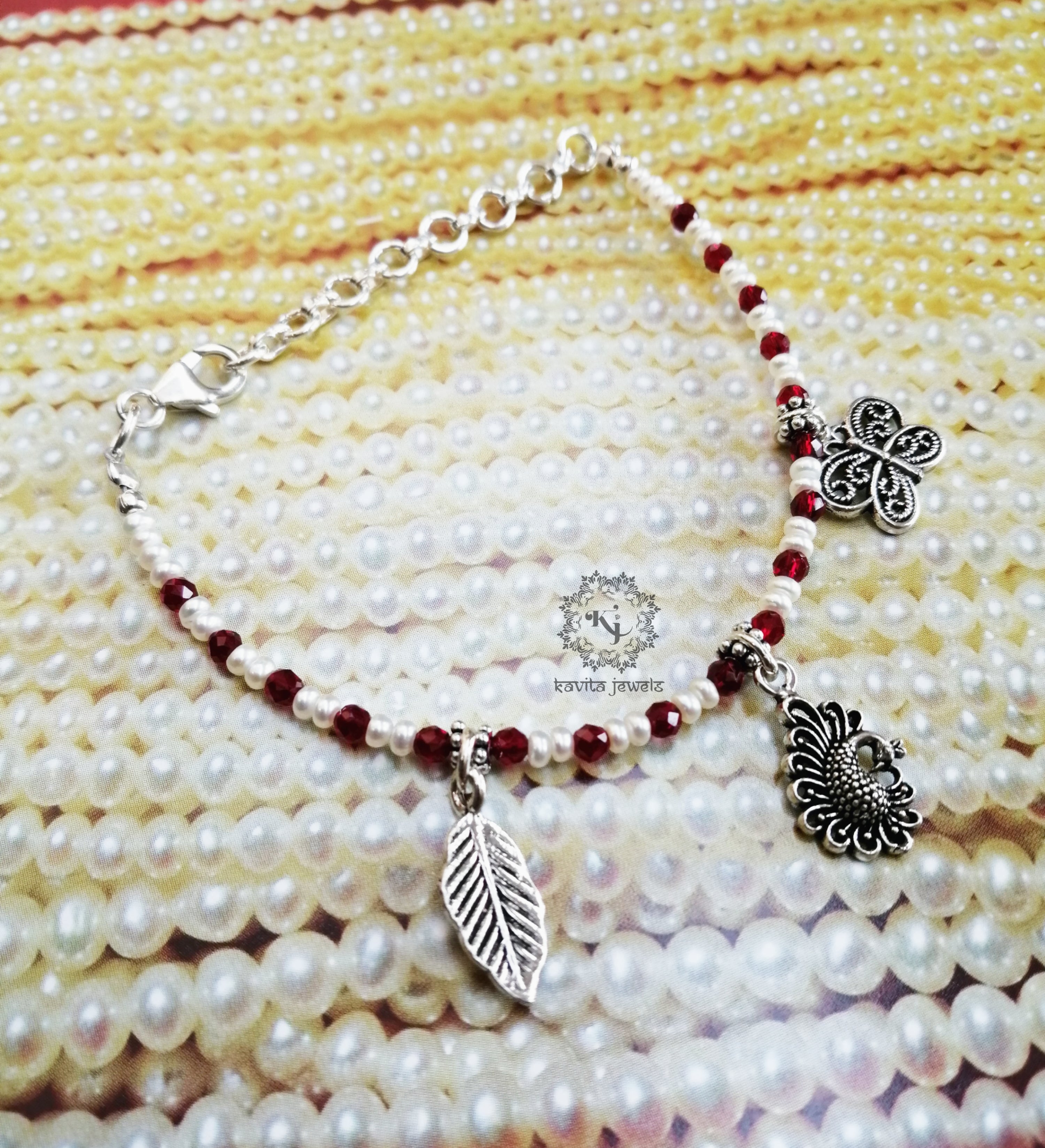 Pearl charms bracelet