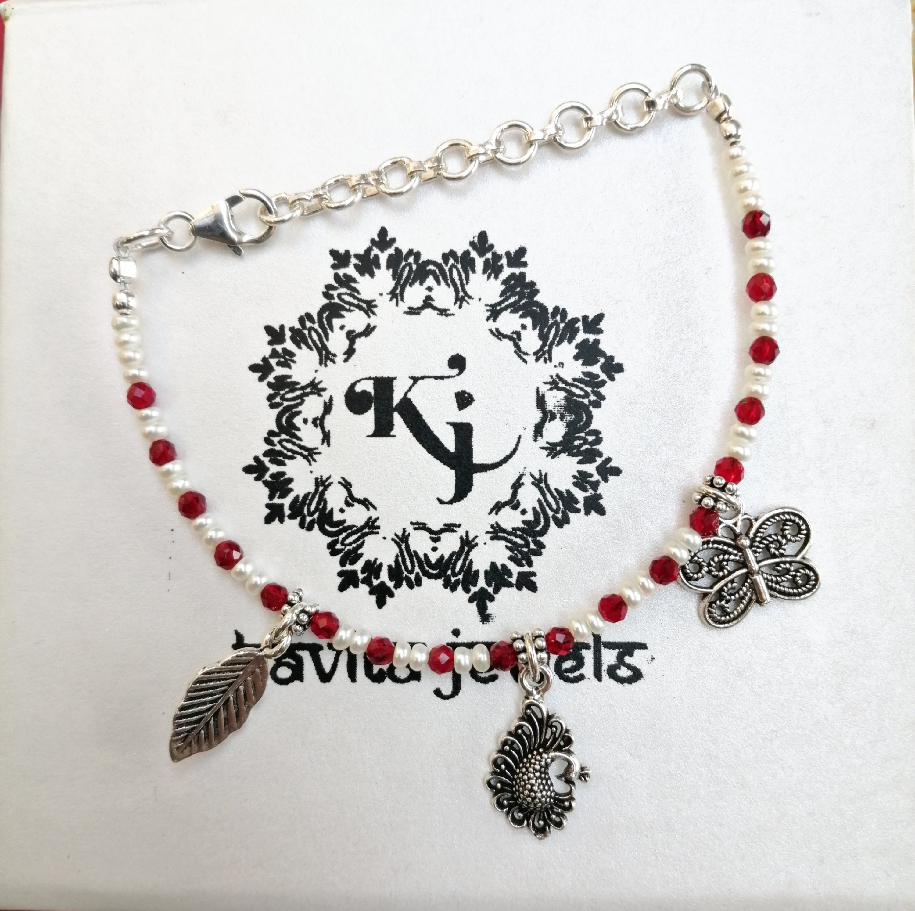 Pearl charms bracelet