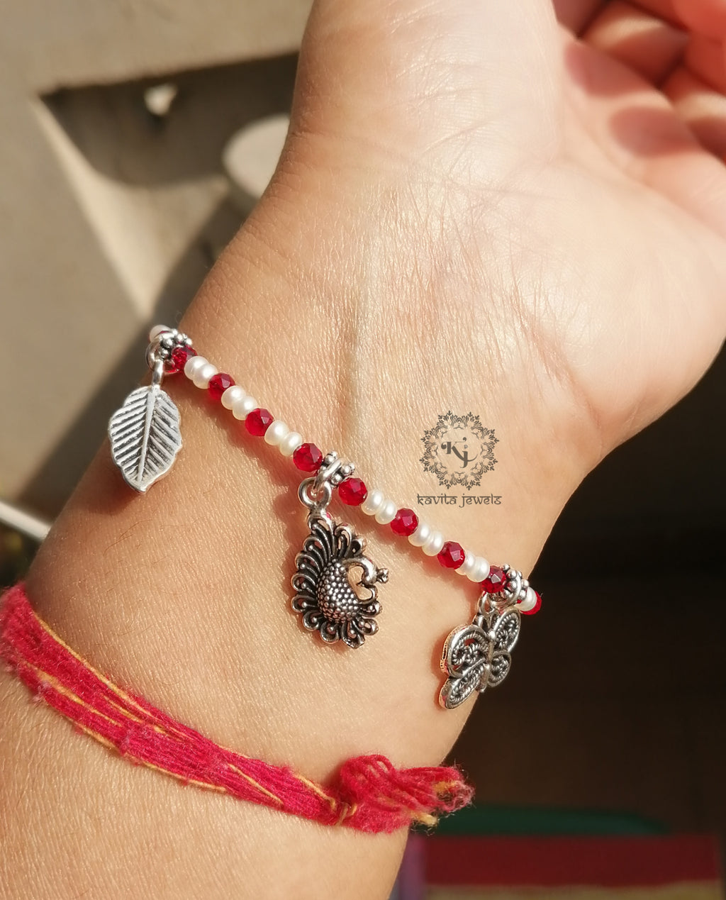 Pearl charms bracelet
