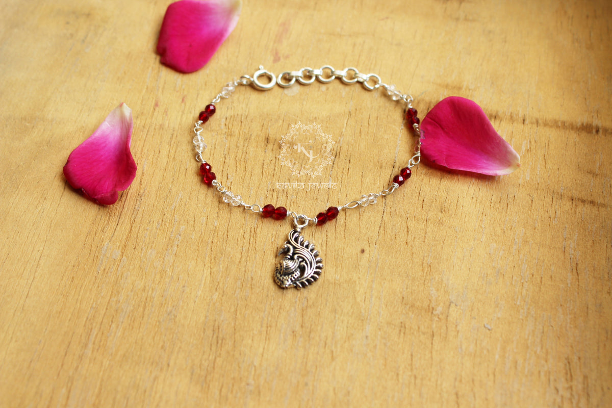 Ruby Red Bracelet with Peacock Charm