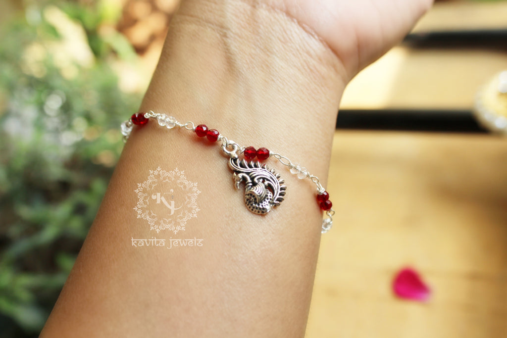 Ruby Red Bracelet with Peacock Charm