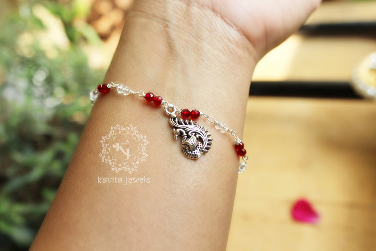 Ruby Red Bracelet with Peacock Charm