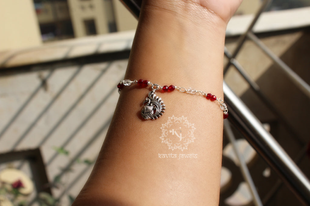 Ruby Red Bracelet with Peacock Charm